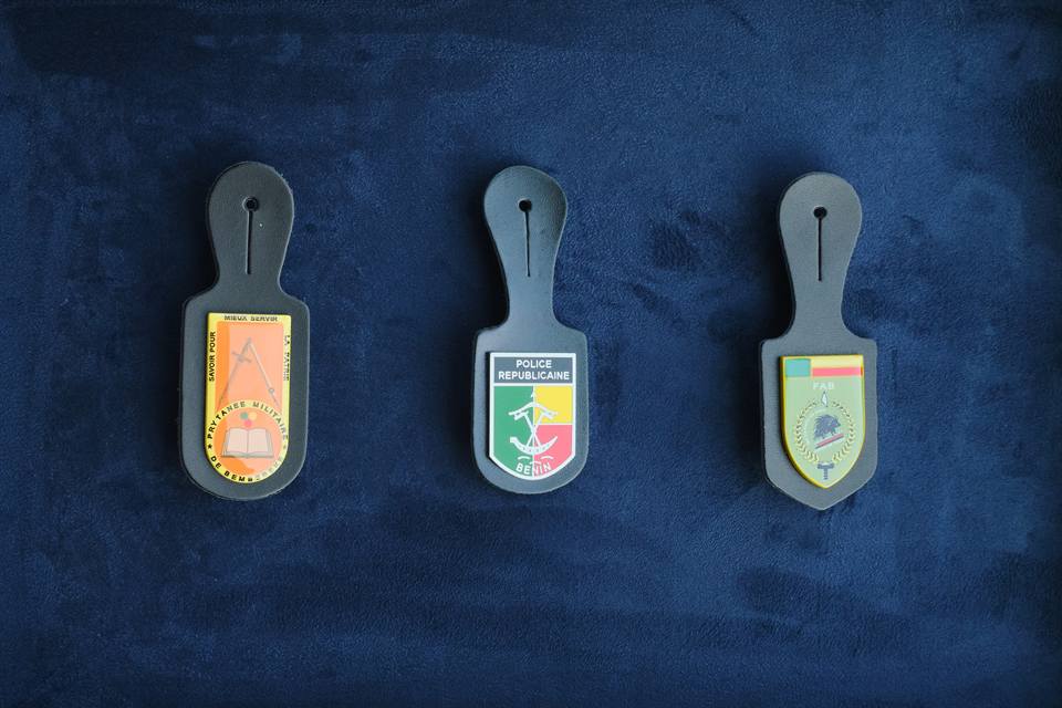 Corporate identity program shields and badges